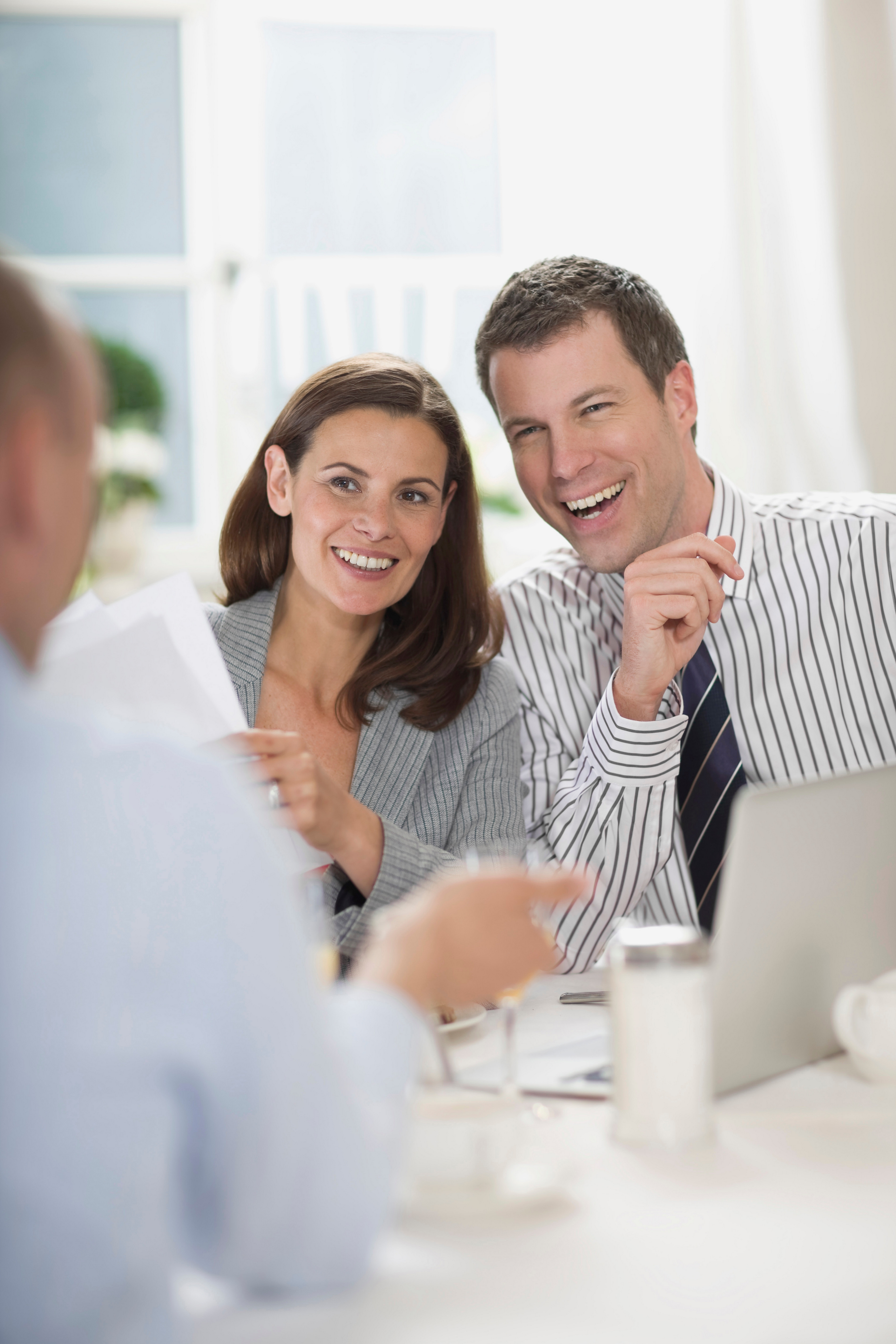 Happy business owners after tax resolution